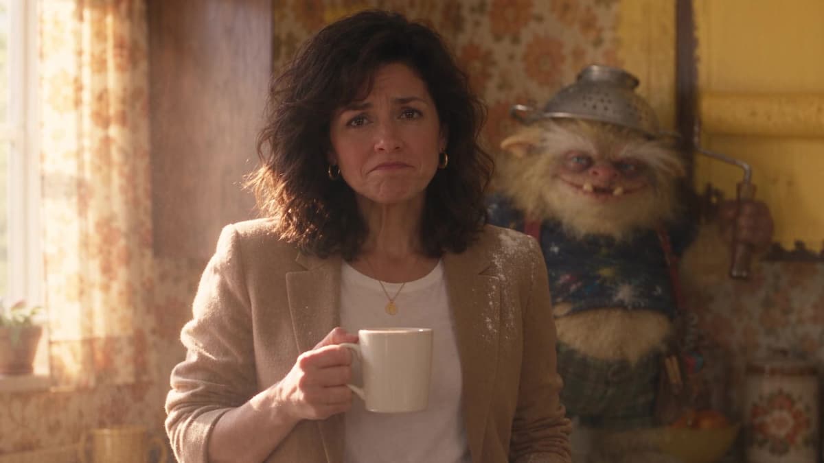 The homeowner from our ads looks unimpressed while a goblin grins over her shoulder.