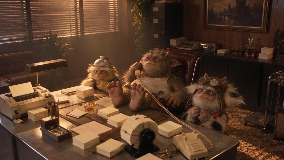 Three goblins in a smoky 1970s office, surrounded by stacks of paper lead forms and a rotary phone.